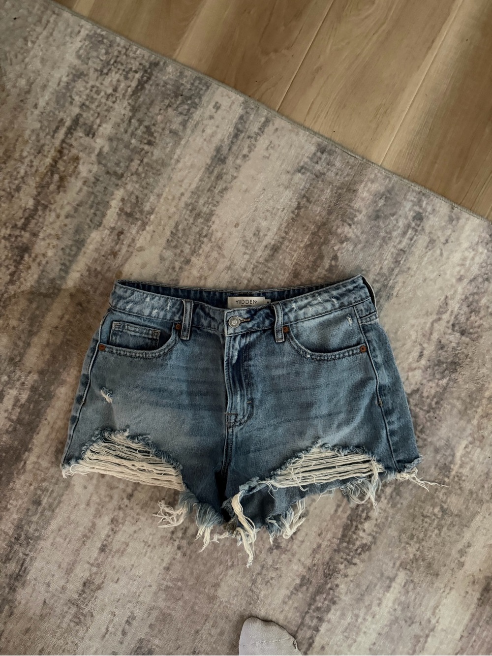 High-Rise Distressed Light Blue Denim Shorts